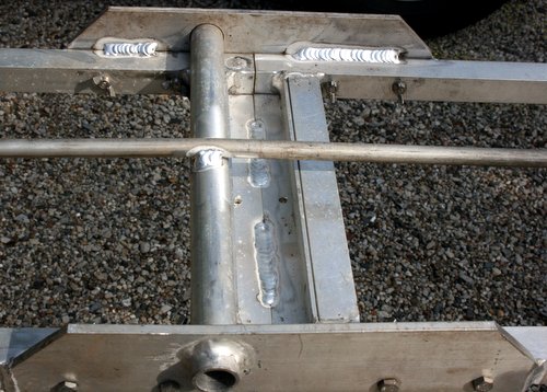 Photo of rod and internal side welds on teeter